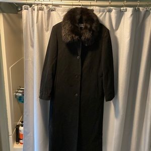 Woman’s black long wool coat with fox fur collar